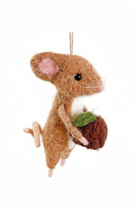 Felted mouse ornament holding a acorn on a white background