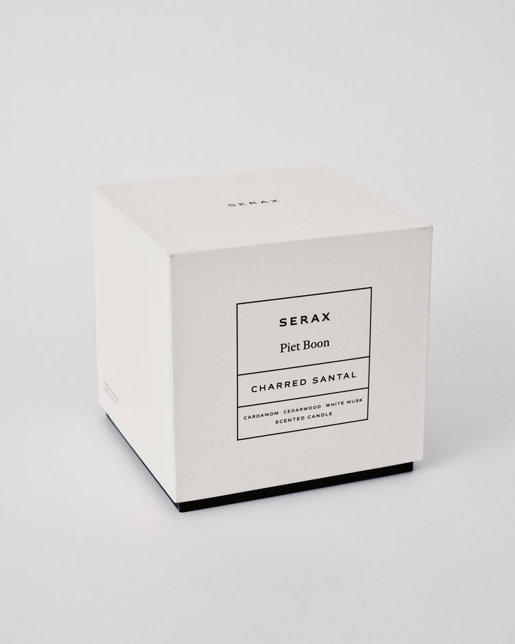 Serax candle box with 'Charred Santal' on a light gray background