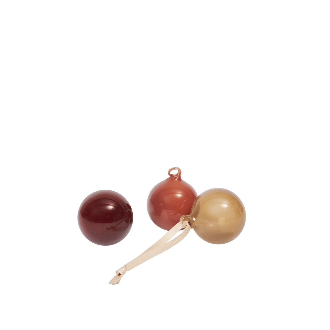 Three wooden beads in red, brown, and beige on a white background