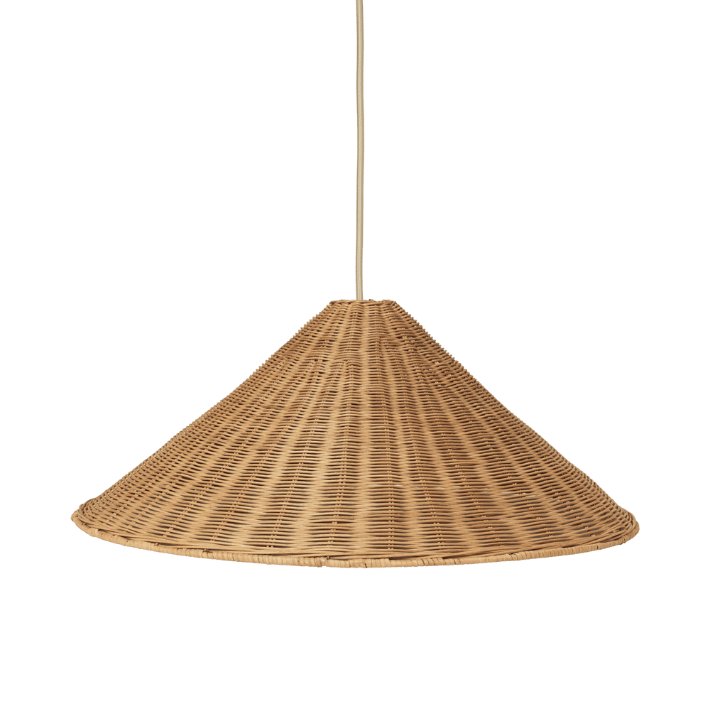 Woven rattan pendant light on a green background