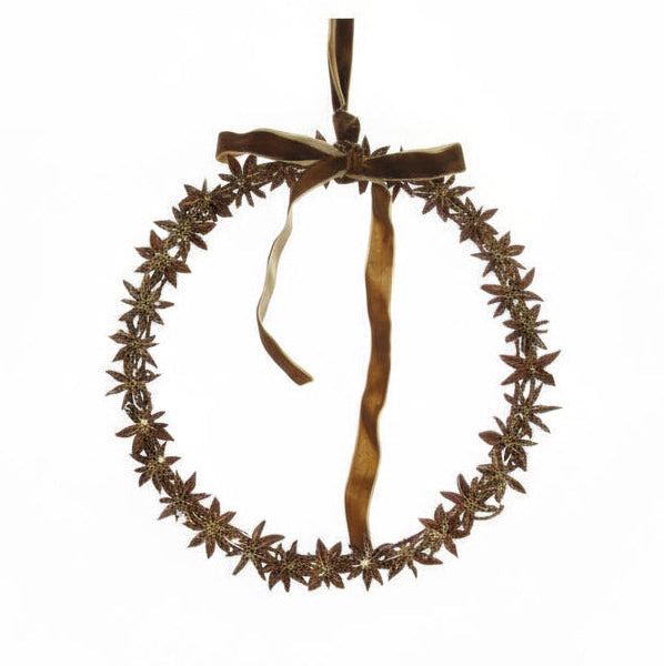 Decorative wreath with star-shaped elements and a brown ribbon on a white background