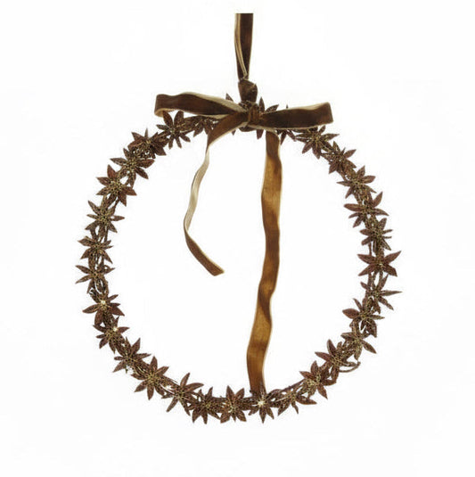Decorative wreath with star-shaped elements and a brown ribbon on a white background