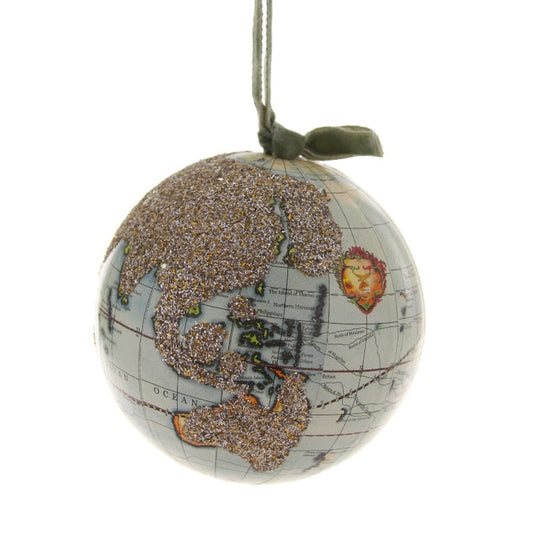 Decorative ornament shaped like a globe with map design on a white background