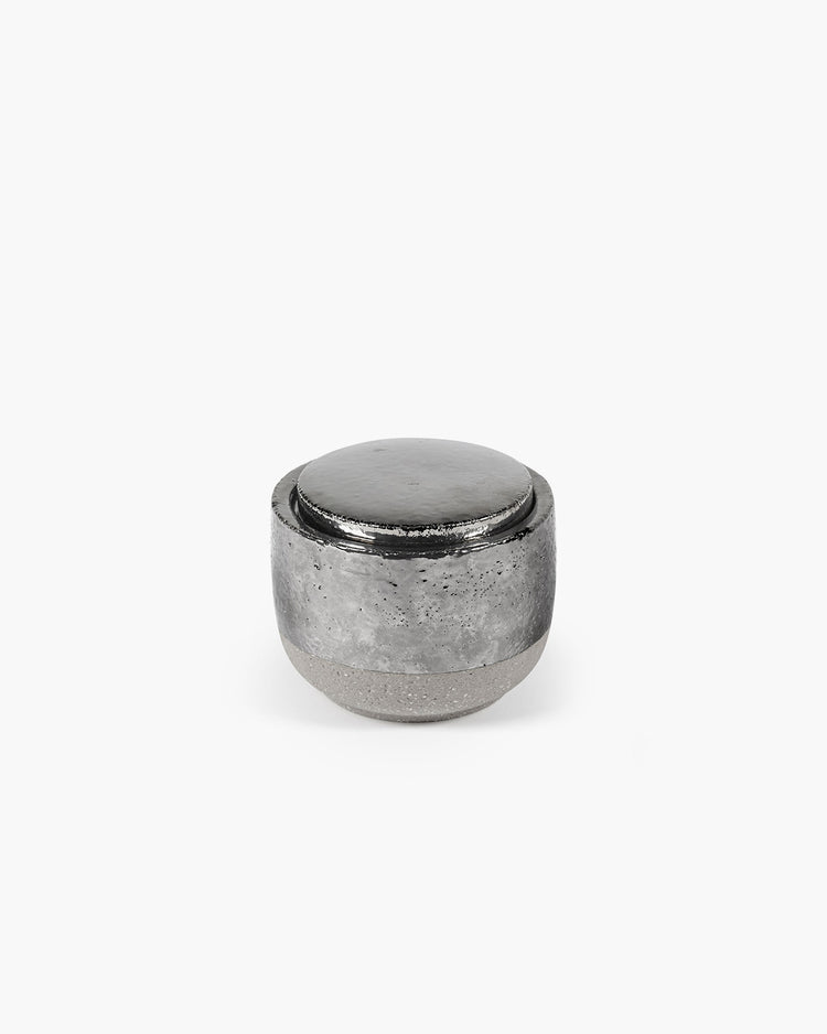 Silver metallic container on a white background