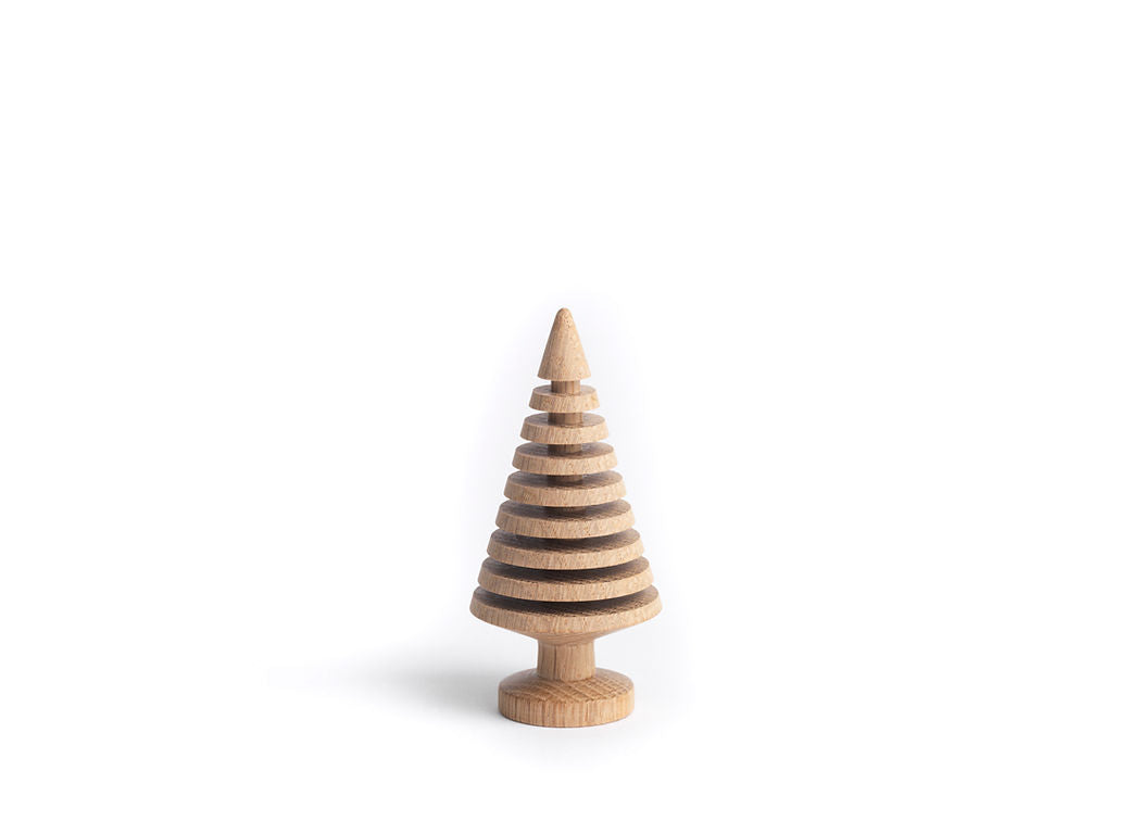 Wooden Christmas tree ornament on a white background