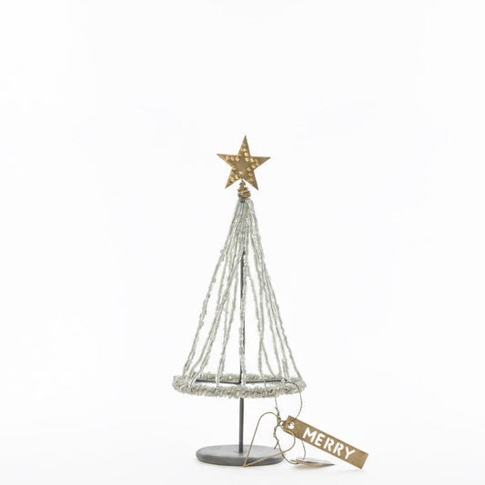 Decorative Christmas tree with star on top and 'Waldherbst' tag on a white background