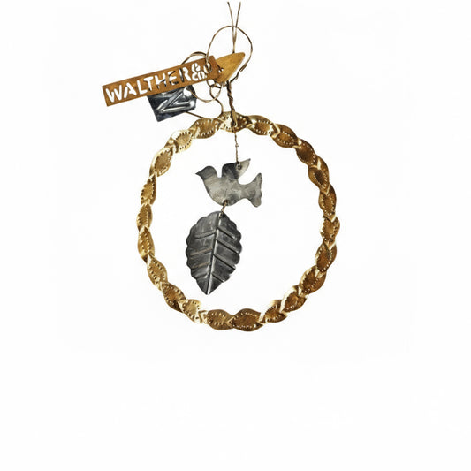 Decorative ornament with gold and silver elements on a white background